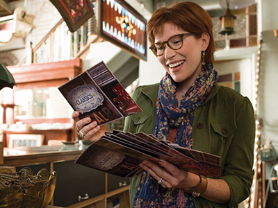 Female customer looking at flyers